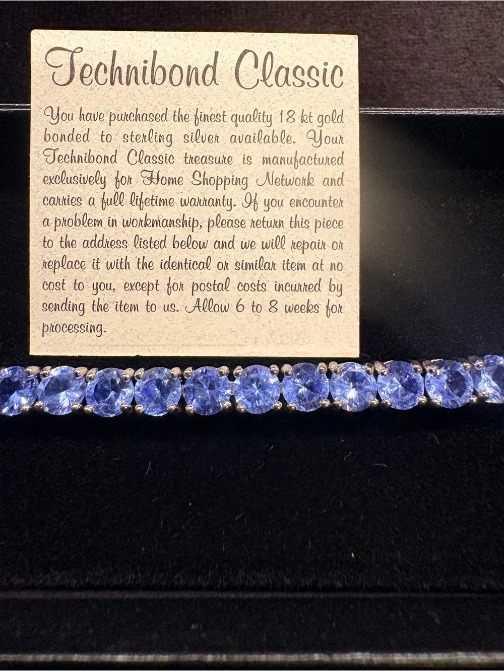 Technibond Blue Round-Cut Tennis Bracelet in 18 Kt Gold Bonded Setting
